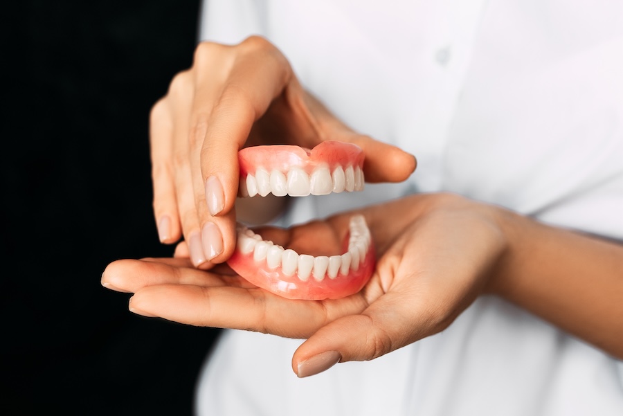 dental implants, dentures, implant-supported dentures, missing teeth, tooth loss, dental prosthetics, Windmill Dental, Amarillo TX, Dr. Austin Whetten